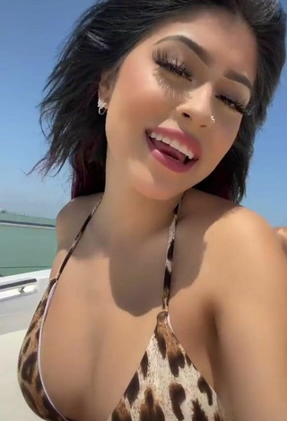 4. Hot Desiree Montoya Shows Cleavage in Leopard Bikini on a Boat