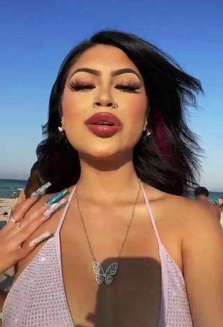 2. Cute Desiree Montoya Shows Cleavage in Purple Bikini Top at the Beach