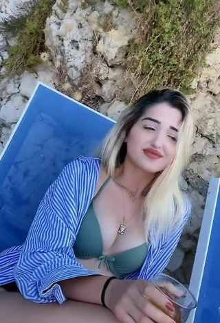 4. Cute Eda Aslankoç Shows Cleavage in Olive Bikini Top