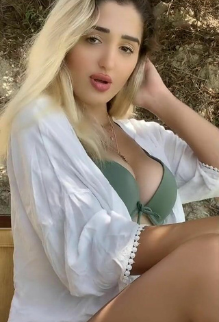 2. Sexy Eda Aslankoç Shows Cleavage in Olive Bikini Top