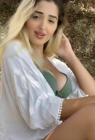 4. Sexy Eda Aslankoç Shows Cleavage in Olive Bikini Top