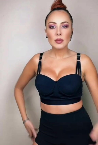 Sexy Erika Shows Cleavage in Black Crop Top