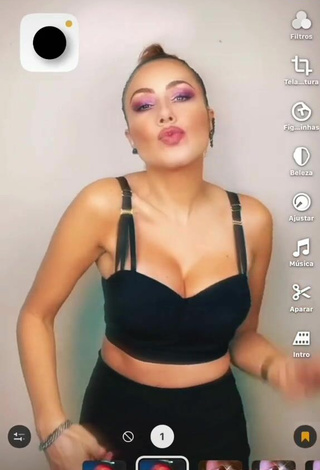 3. Sexy Erika Shows Cleavage in Black Crop Top