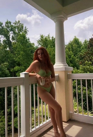 2. Sexy Faith Collins in Green Bikini on the Balcony