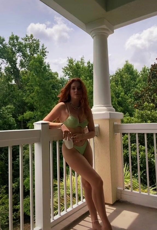 5. Sexy Faith Collins in Green Bikini on the Balcony