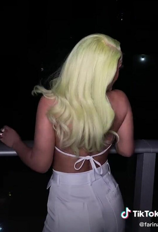 5. Erotic Farina Shows Cleavage in White Crop Top on the Balcony