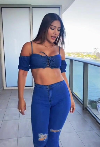 2. Sweetie Farina in Blue Crop Top on the Balcony