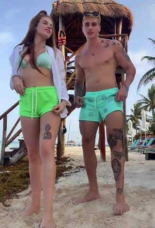1. Sexy Flávia Charallo in Light Green Bikini Top at the Beach