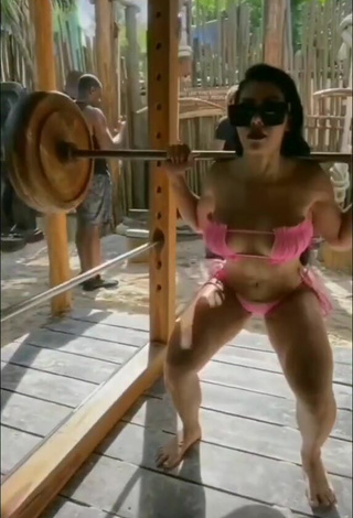 2. Lovely Franjomar Shows Cleavage in Pink Bikini while doing Fitness Exercises