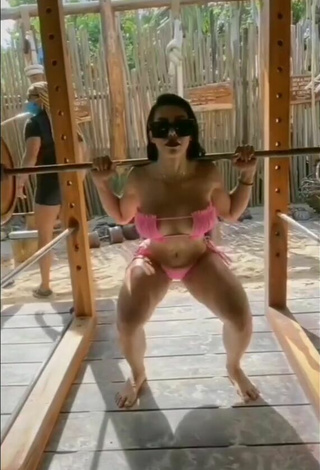 4. Lovely Franjomar Shows Cleavage in Pink Bikini while doing Fitness Exercises