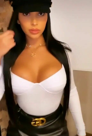 Sexy Franjomar Shows Cleavage in White Top