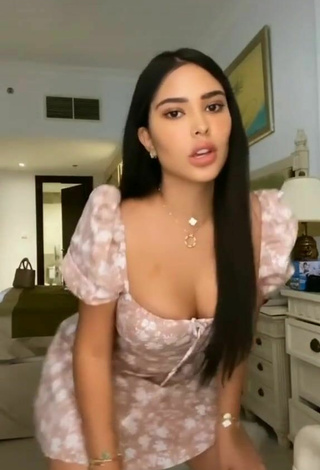 2. Erotic Franjomar Shows Cleavage in Floral Dress