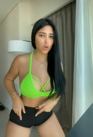 5. Cute Franjomar Shows Cleavage in Green Crop Top