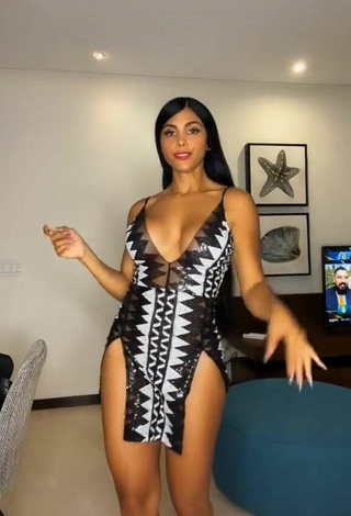 Sexy Franjomar Shows Cleavage in Dress