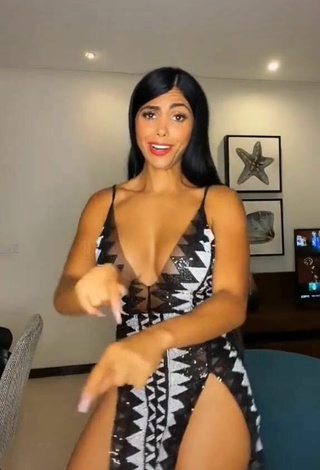 3. Sexy Franjomar Shows Cleavage in Dress