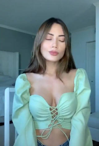 3. Really Cute Georgina Mazzeo Shows Cleavage in Green Crop Top