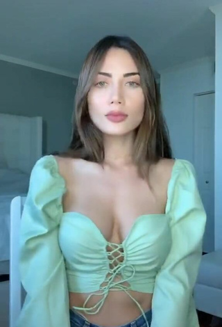 4. Really Cute Georgina Mazzeo Shows Cleavage in Green Crop Top