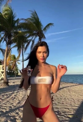 4. Hottest Georgina Mazzeo Shows Cleavage in White Bikini Top at the Beach