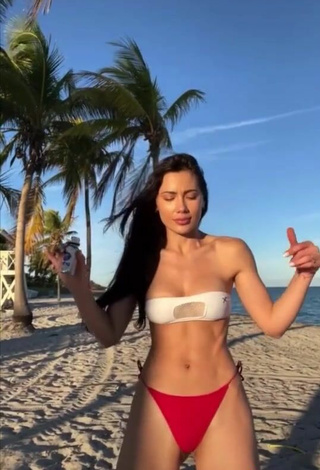 5. Hottest Georgina Mazzeo Shows Cleavage in White Bikini Top at the Beach