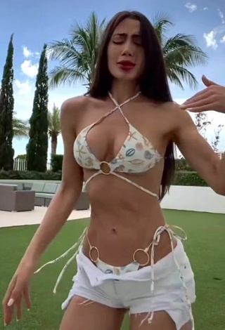 2. Hot Georgina Mazzeo Shows Cleavage in Bikini Top