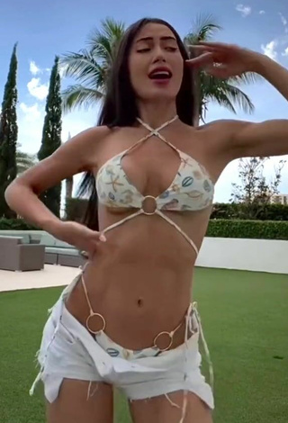 4. Hot Georgina Mazzeo Shows Cleavage in Bikini Top