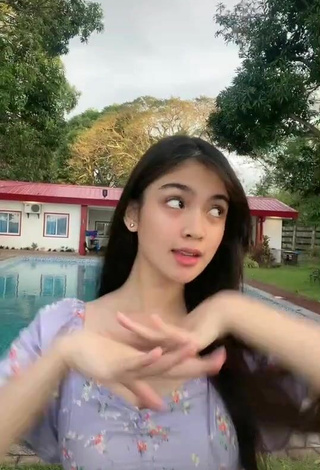 2. Sexy Heaven Peralejo Shows Cleavage in Floral Dress at the Swimming Pool