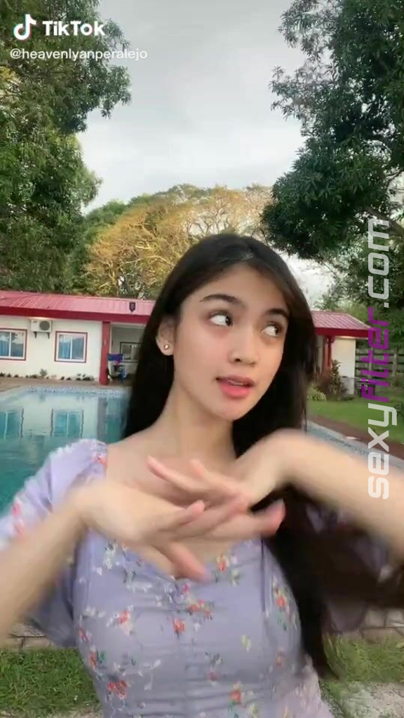 Sexy Heaven Peralejo Shows Cleavage In Floral Dress At The Swimming