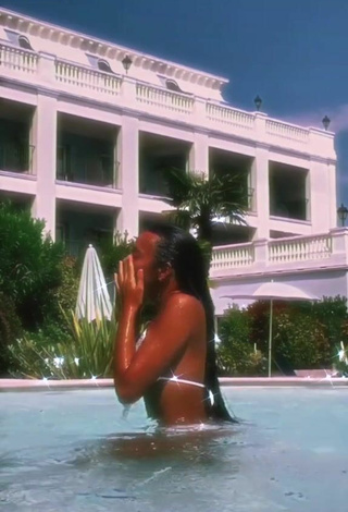 3. Cute Iris Ferrari in White Bikini at the Swimming Pool