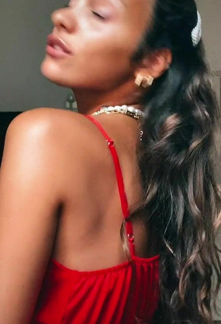 Sexy Iris Ferrari Shows Cleavage in Red Dress