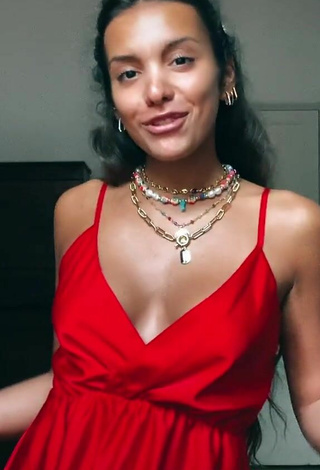 3. Sexy Iris Ferrari Shows Cleavage in Red Dress