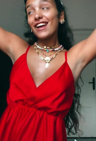 5. Sexy Iris Ferrari Shows Cleavage in Red Dress