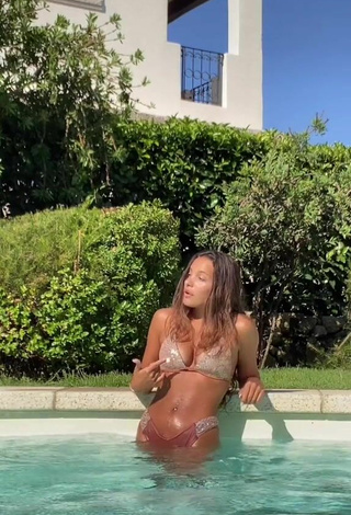 Sexy Iris Ferrari Shows Cleavage in Beige Bikini at the Pool