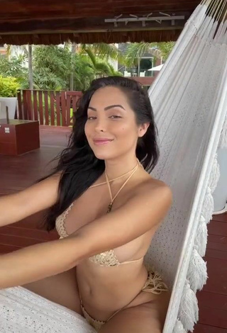 2. Sweet Maddy Belle Shows Cleavage in Cute Golden Bikini