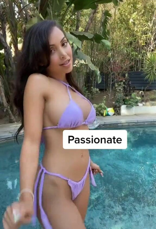 5. Amazing Maddy Belle Shows Cleavage in Hot Purple Bikini at the Pool