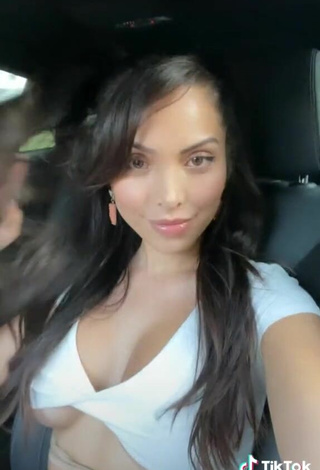 3. Sexy Maddy Belle Shows Cleavage in White Crop Top in a Car