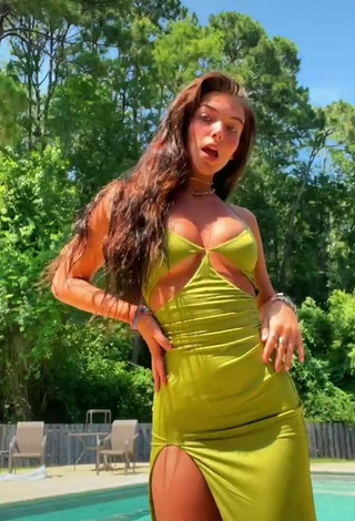 3. Sexy Jordan Beckham in Green Dress at the Swimming Pool
