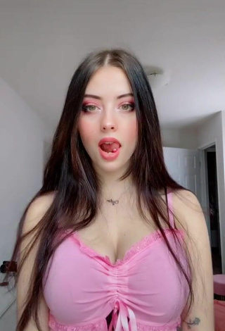 4. Hot Julia Burch Shows Cleavage in Pink Top