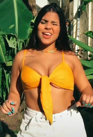 3. Julia Antunes Looks Sexy in Yellow Bikini Top