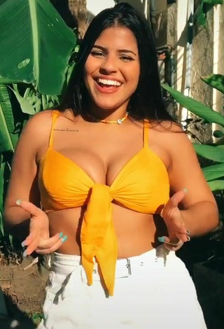 4. Julia Antunes Looks Sexy in Yellow Bikini Top