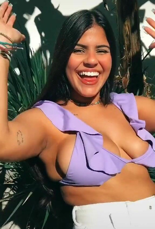 3. Julia Antunes Shows Cleavage in Nice Purple Bikini Top