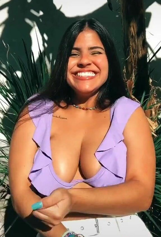 5. Julia Antunes Shows Cleavage in Nice Purple Bikini Top
