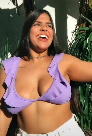 5. Julia Antunes Shows Cleavage in Appealing Purple Bikini Top