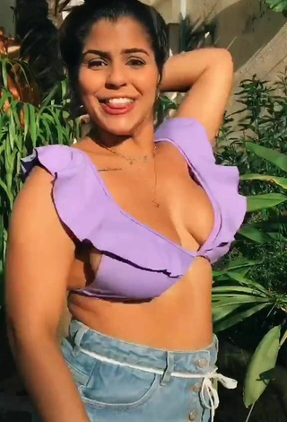 3. Julia Antunes Shows Cleavage and Bouncing Boobs in Seductive Purple Bikini Top