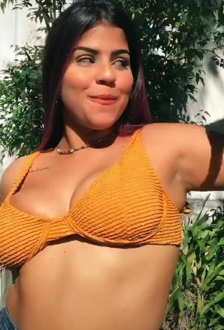 2. Julia Antunes Shows Cleavage in Sweet Orange Bikini Top