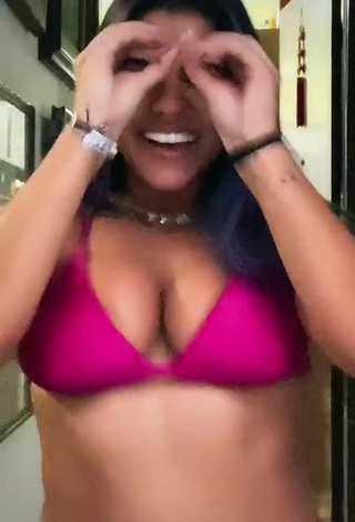 Adorable Julia Antunes Shows Cleavage and Bouncing Boobs in Seductive Violet Bikini