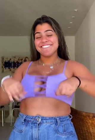 Seductive Julia Antunes Shows Cleavage and Bouncing Boobs in Purple Crop Top