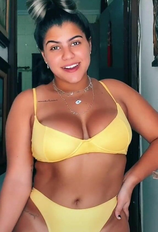 Seductive Julia Antunes Shows Cleavage in Yellow Bikini