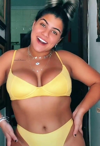 2. Seductive Julia Antunes Shows Cleavage in Yellow Bikini