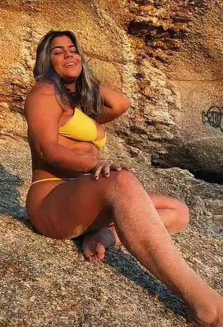 2. Sweet Julia Antunes Shows Cleavage in Cute Yellow Bikini at the Beach