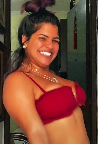 5. Erotic Julia Antunes Shows Cleavage and Bouncing Boobs in Red Bikini